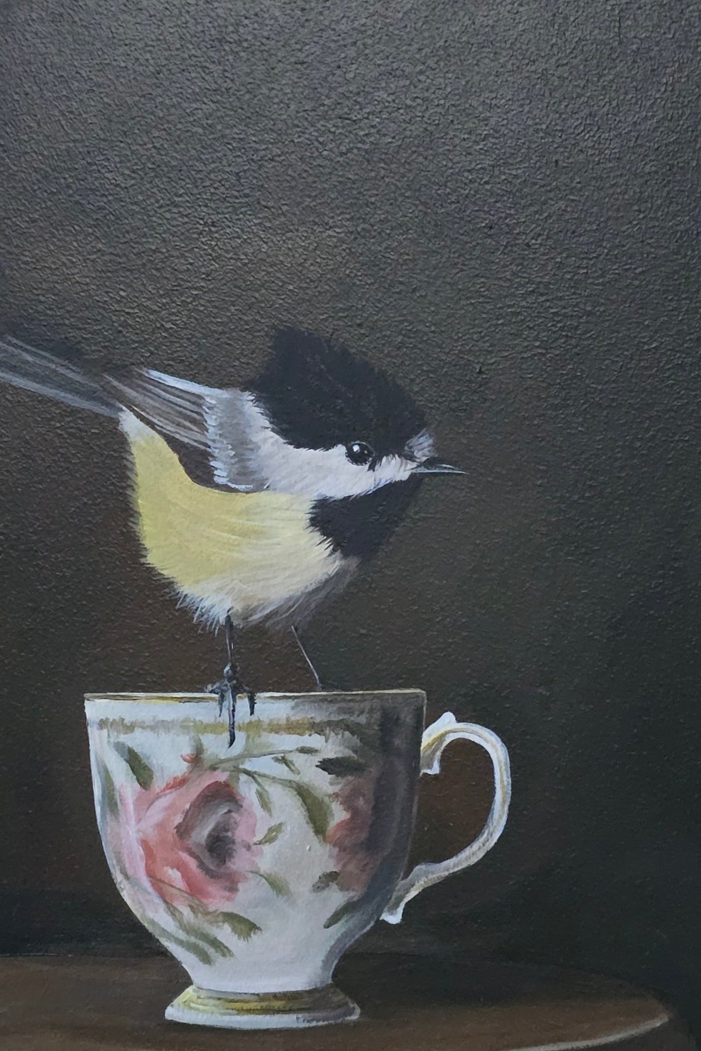 Brid on teacup